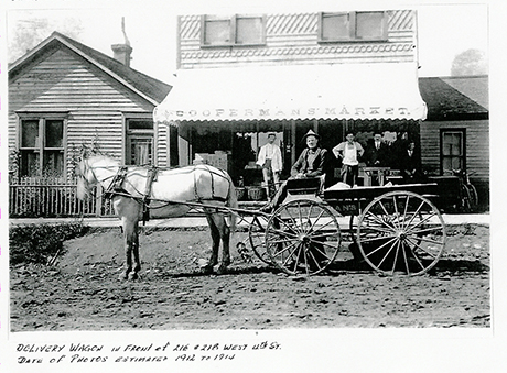 A wagon in front of the Cooperman Market sometime between 1912 and 1914 at 112 West 4th Street.