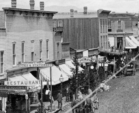 This photograph shows the line of small shops where Abraham would later open his first store on Harrison Avenue.