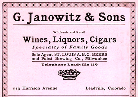 Half page advertisement printed on pink paper for G. Janowitz & Sons in the 1908 Leadville city directory. 