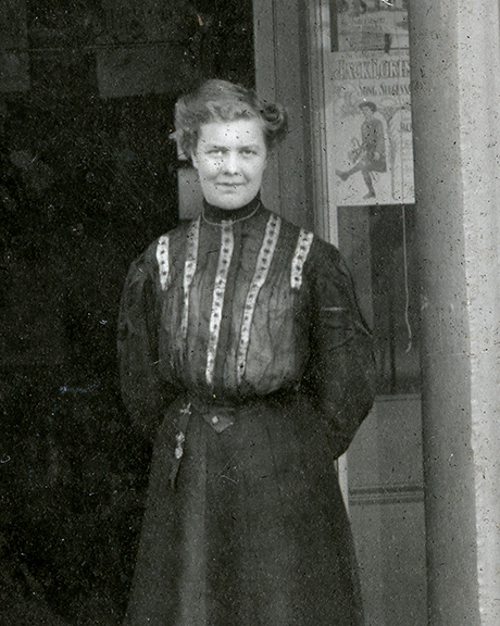 Photo of presumably Mrs. Klein standing outside the music store possibly in March of 1907.