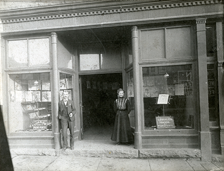 Cabinet photo of Leo Klein and presumably Mrs. Klein outside of the music store in Leadville possibly in March of 1907.