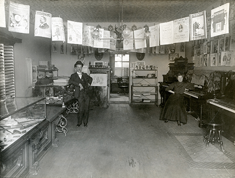 Cabinet photo of Leo Klein and presumably Mrs. Klein inside the music store in Leadville in March of 1907.