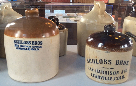 Liquor jugs by Schloss and others.