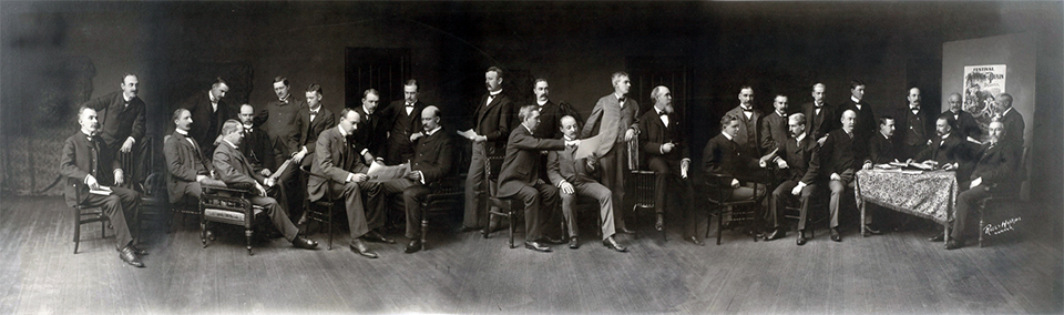 Collaged panoramic photo of the Board of Directors for the 1899 Colorado Festival of Mountain and Plain. Wolfe Londoner is standing in the back near the far right.