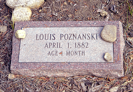 Detail view of the modern replacement grave marker for the original marker that was lost to time.