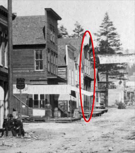 Cropped detail of same photo with building circled.