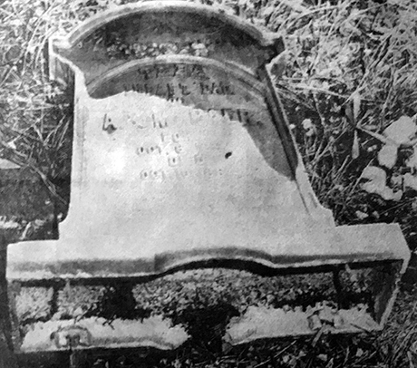 The overturned headstone of Thea Baer after vandals knocked it over in 1970.